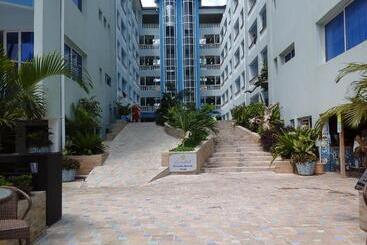 Cowrie Shell Beach Apartments Official