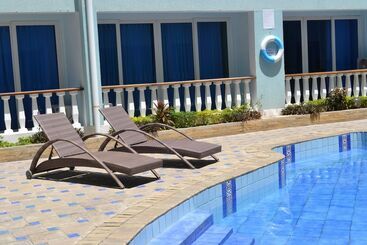 Cowrie Shell Beach Apartments Official