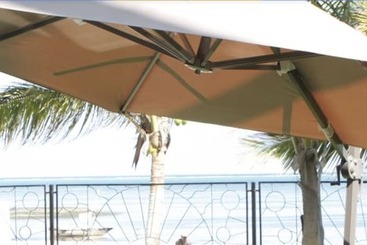 Cowrie Shell Beach Apartments Official
