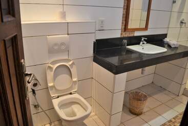 Cowrie Shell Beach Apartments Official