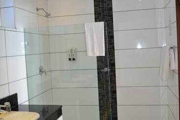 Cowrie Shell Beach Apartments Official