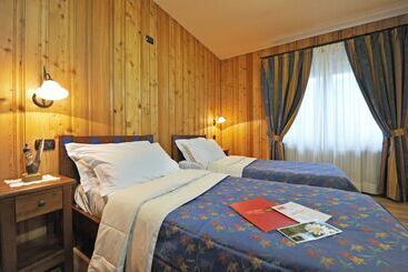 هتل Family Apartments Le Chalet
