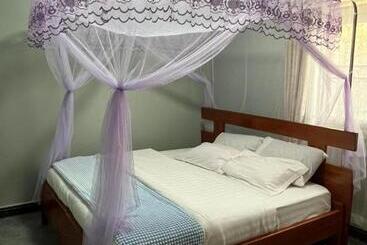 تختخواب و صبحانه Ronald Virtue Apartments