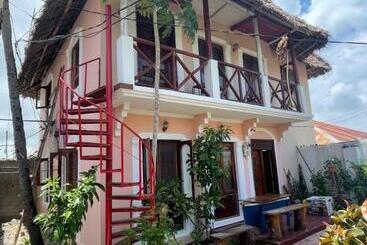 تختخواب و صبحانه Babalao Boutique Villa