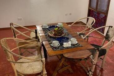 تختخواب و صبحانه Babalao Boutique Villa