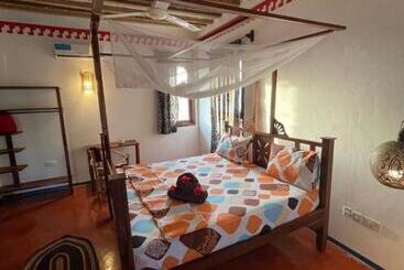 تختخواب و صبحانه Babalao Boutique Villa