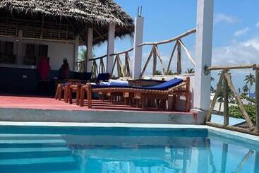 تختخواب و صبحانه Babalao Boutique Villa