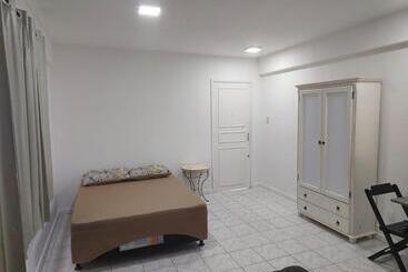 Quarto Bem Localizado
