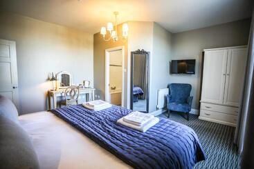 تختخواب و صبحانه The Lazy Goose Coffee House & Bedrooms