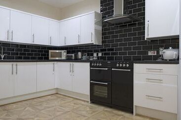 تختخواب و صبحانه Cargo Cafe Apartments
