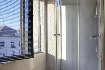 هتل Executive Rooms And Suites Play