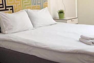 هتل Executive Rooms And Suites Play