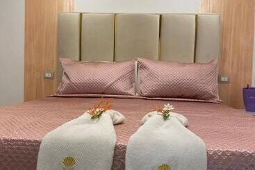 تختخواب و صبحانه Elegance Paema