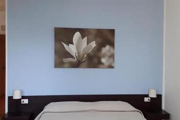 تختخواب و صبحانه Magnolia Room & Breakfast