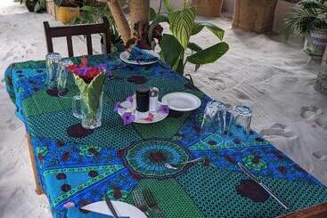 تختخواب و صبحانه Kua Garden Cottage