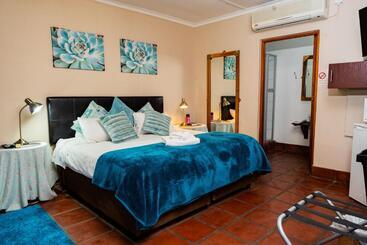 تختخواب و صبحانه Riverbank Lodge