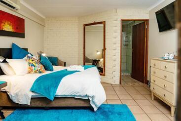 تختخواب و صبحانه Riverbank Lodge