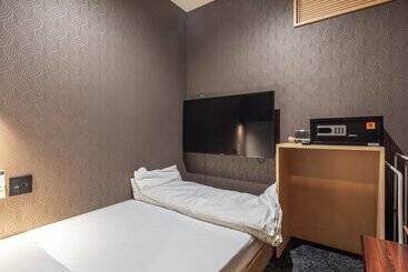 هتل Asahi Sauna Capsule Inn Hirosaki