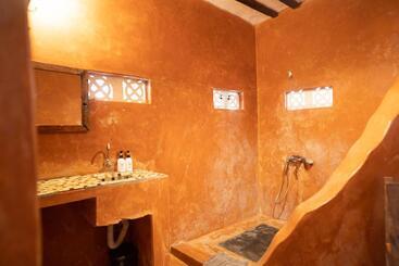 تختخواب و صبحانه Pili Pili Beach Bungalows