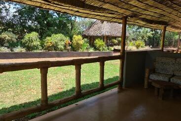 هتل Honey Badger Lodge