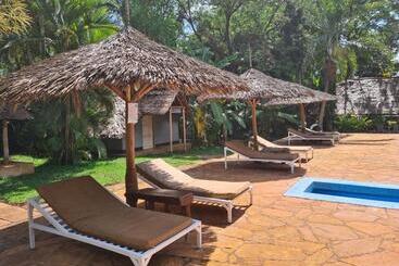 هتل Honey Badger Lodge
