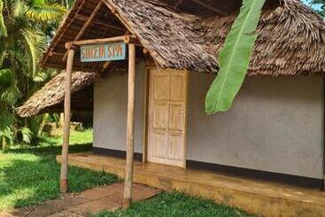 هتل Honey Badger Lodge