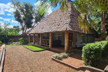 هتل Honey Badger Lodge