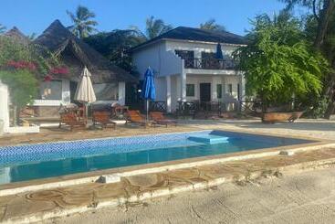 Отель Kaure Sand Beach Lodge