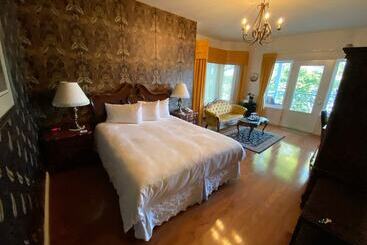 هتل Auberge Sous Les Arbres