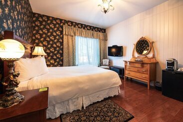 هتل Auberge Sous Les Arbres