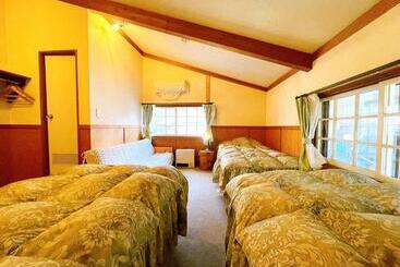 تختخواب و صبحانه Hakuba Pension & Log Hotel Meteor
