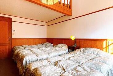 تختخواب و صبحانه Hakuba Pension & Log Hotel Meteor