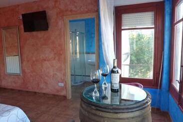 旅馆 Hostal A La Sombra Del Laurel