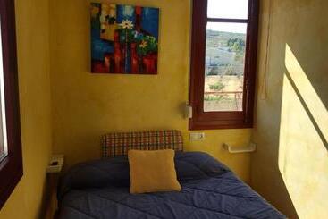旅馆 Hostal A La Sombra Del Laurel