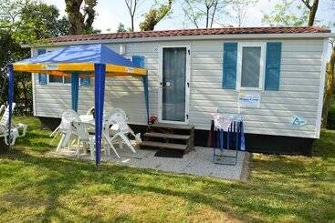 هتل Happy Camp Mobile Homes In Camping Village Baia Paradiso