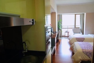 هتل Yumi Apartment Pujun Station Branch