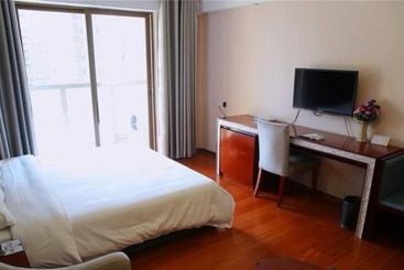 هتل Yumi Apartment Pujun Station Branch