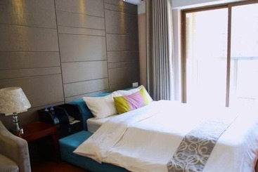 هتل Yumi Apartment Pujun Station Branch