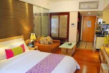 هتل Yumi Apartment Pujun Station Branch