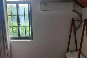 پانسیون Shanghai Hua Xi Shui Xie Guesthouse