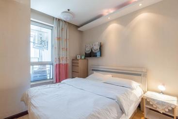 Dalian Xiuzhu Mansion Apartment
