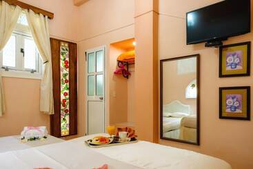 تختخواب و صبحانه Casa Marisela De Colores