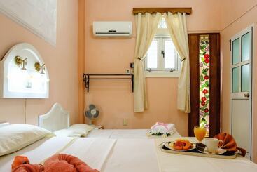 تختخواب و صبحانه Casa Marisela De Colores