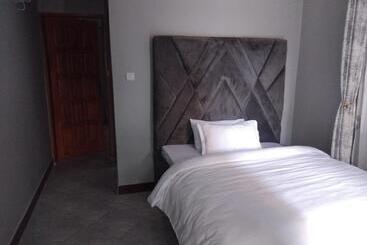 تختخواب و صبحانه Meuly Family Lodge