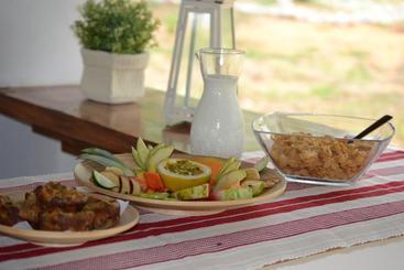 تختخواب و صبحانه Naturalmente Boutique Bungalows Y Cocina Mediterránea