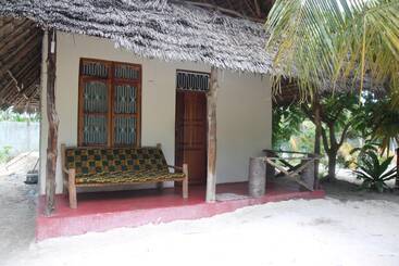 تختخواب و صبحانه Mpole Bungalows