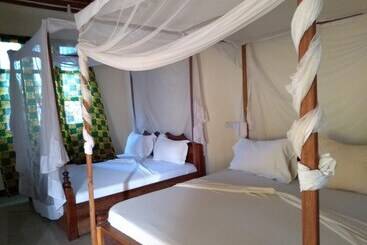 تختخواب و صبحانه Mpole Bungalows