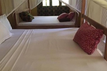 تختخواب و صبحانه Mpole Bungalows