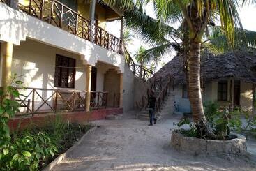 تختخواب و صبحانه Mpole Bungalows