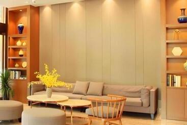 هتل Home Inn Plus Shanghai Middle Ring Jinshajiang Road Fengzhuang Metro Station
